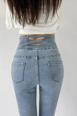 Cut Out Cross Waistband Skinny Jeans